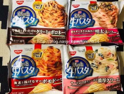 A frozen convenience store meal prepared indoors on a rainy Tokyo evening.