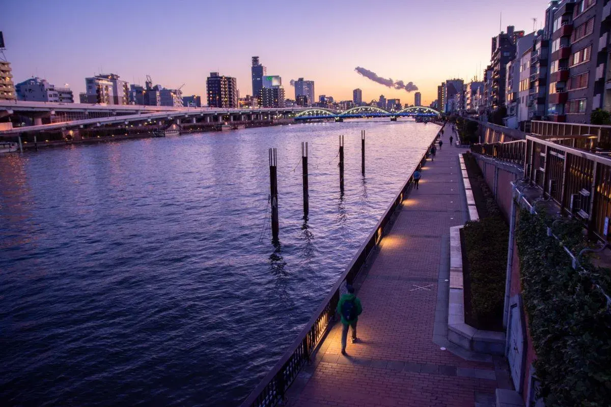 Evening light reflecting on the Sumida River near Ryogoku Bridge.