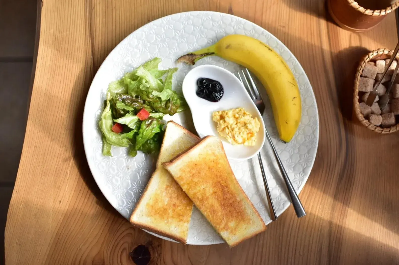 Coffee, rare cheesecake, and a notebook on a quiet table at Higashi-Mukojima Coffee-ten.
